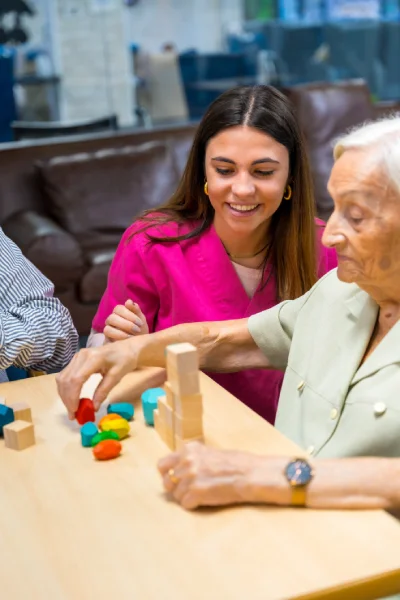 memorycareactivities conroe tx A Vibrant Life caregiver doing memory activities with memory care resident in Conroe TX